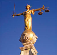 The Old Bailey law courts statue image