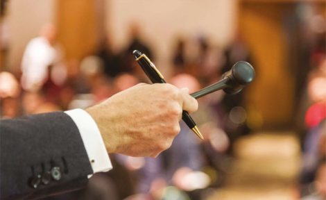 Auctioneer with hammer image