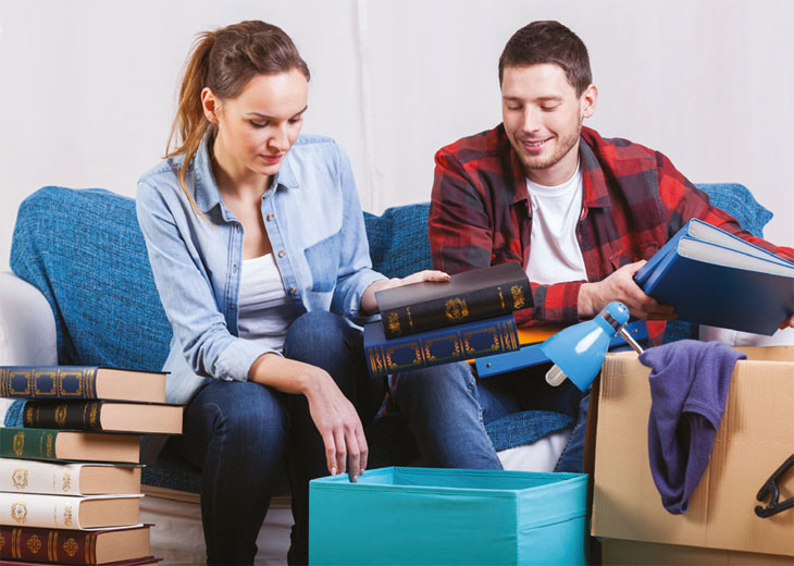 Students unpacking boxes image