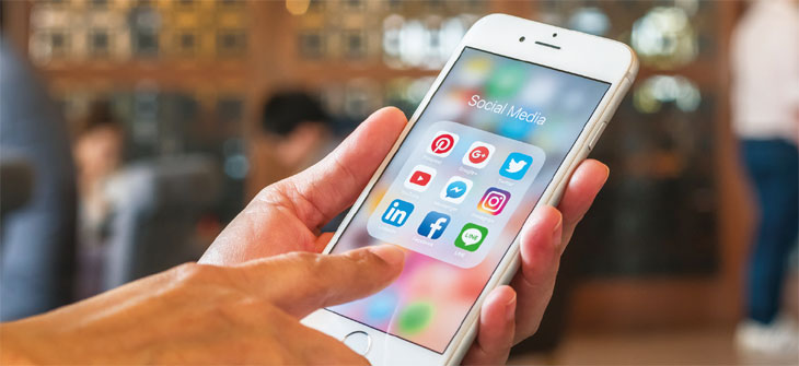 Social media on mobile phone image
