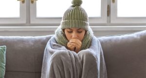 Tenant wrapped in blanket and hat image