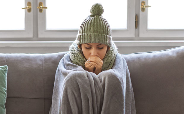 Tenant wrapped in blanket and hat image