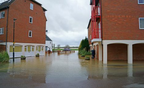 A new build estate on the banks of the River Avon that has been flooded.