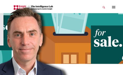 Tom Bill, Knight Frank in front of report