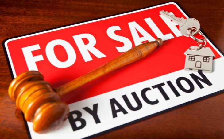 for sale by auction sign and gavel EIG residential auction update