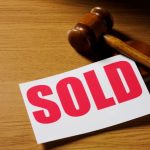 sold sign auction gavel