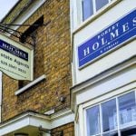 robert holmes acquired by Mount Group