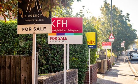 For sale boards in a London street