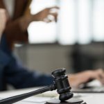 EIG residential auction update - gavel and laptop