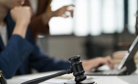 EIG residential auction update - gavel and laptop