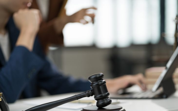 EIG residential auction update - gavel and laptop