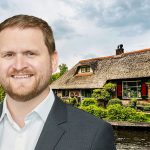 Ryan Etchells and a thatched cottage by water